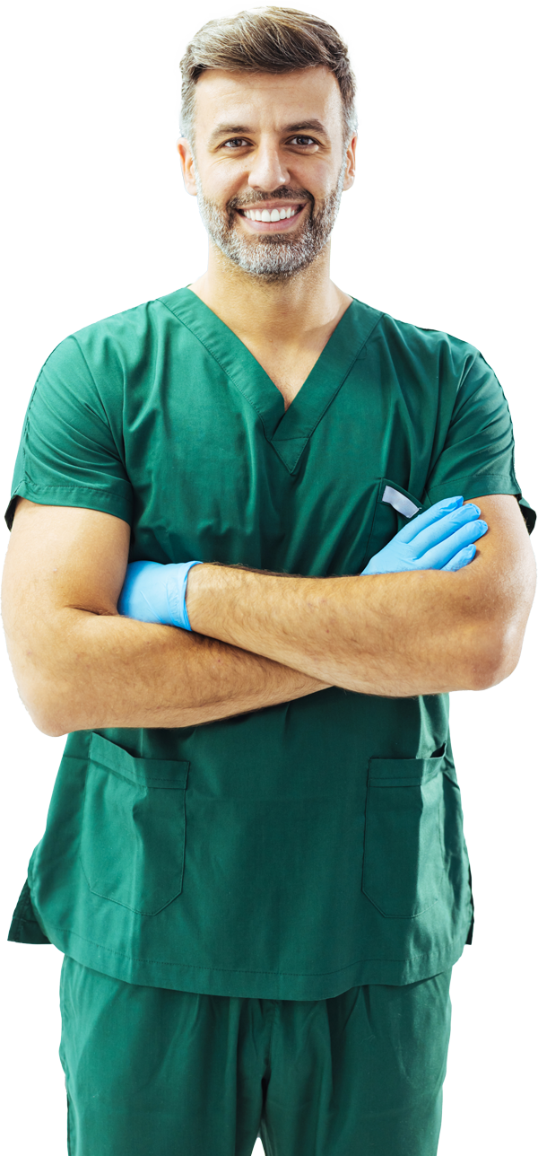 Male dental professional wearing green scrubs